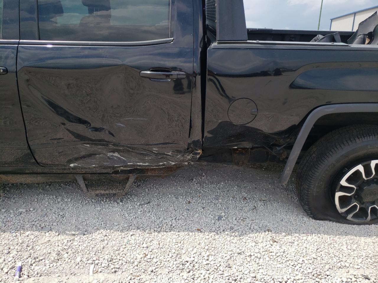 Photo 9 from auction – 2015 GMC SIERRA K25 with VIN 1GT12YE86FF590531