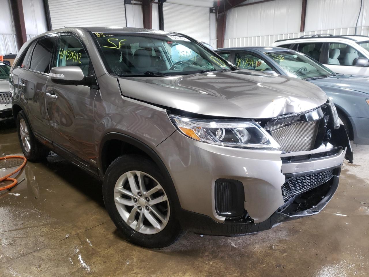KIA SORENTO LX 2014 with VIN 5XYKTCA64EG427204 - Photo from auction