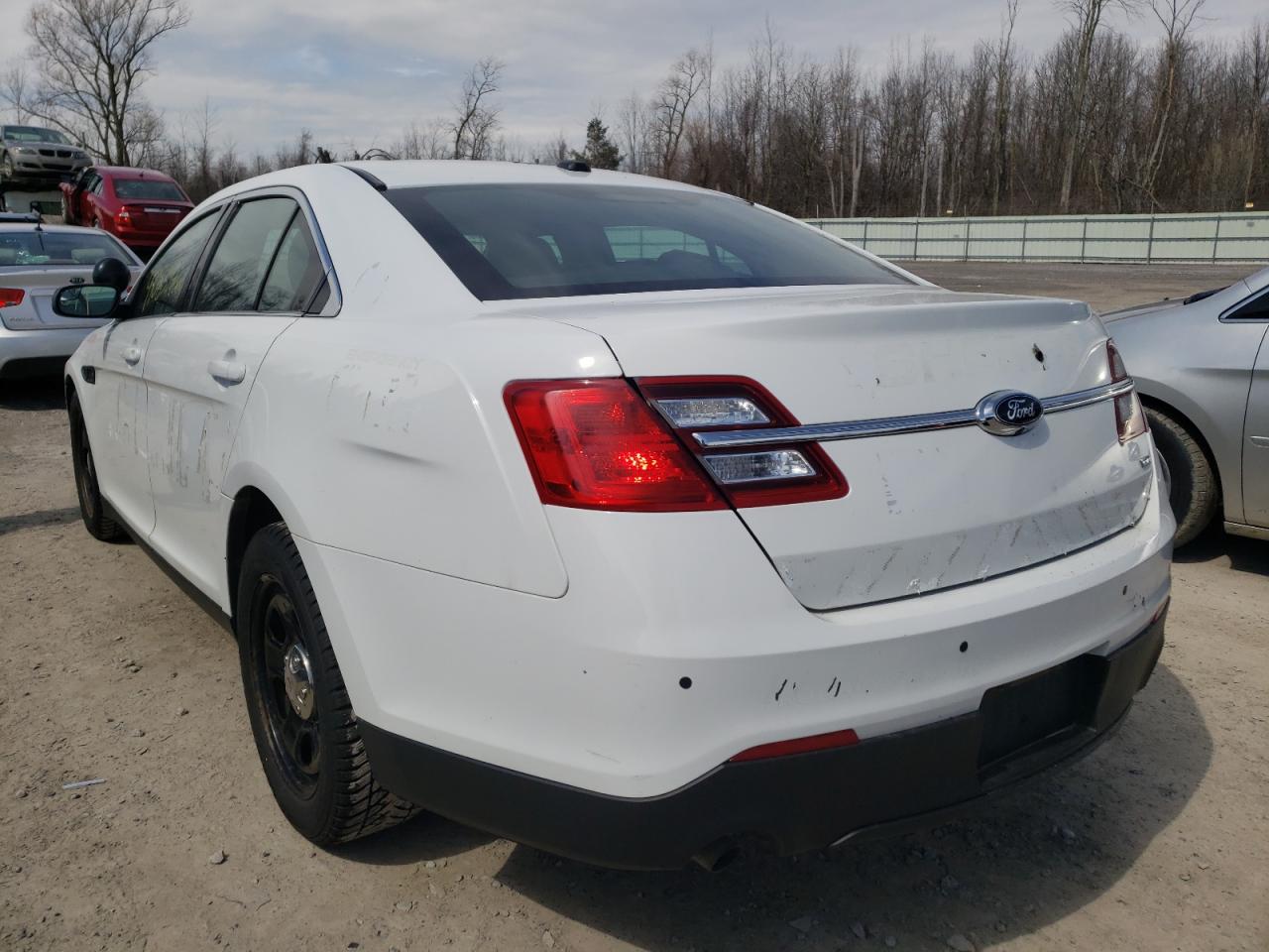 Photo 3 from auction – 2016 FORD TAURUS POL with VIN 1FAHP2MK0GG133791