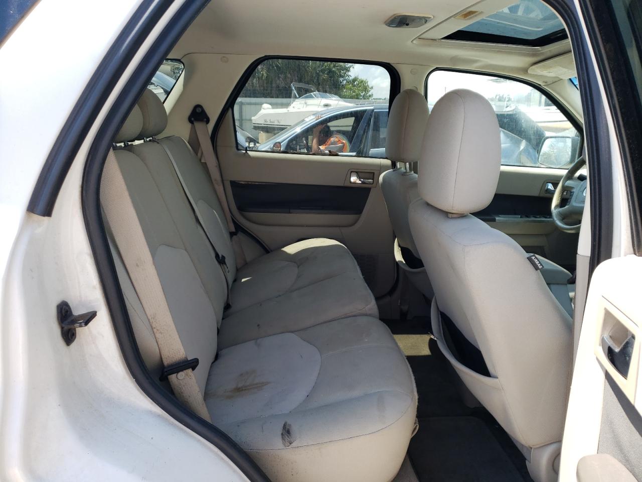 Photo 6 from auction – 2009 MERCURY MARINER with VIN 4M2CU81769KJ00921