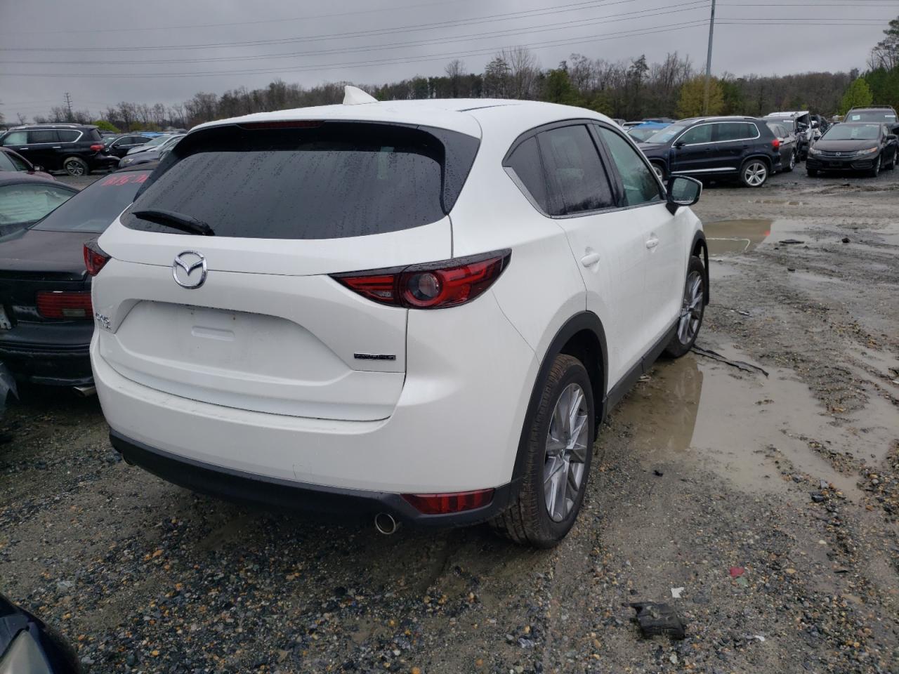 Photo 4 from auction – 2021 MAZDA CX-5 GRAND with VIN JM3KFBDM8M0421252