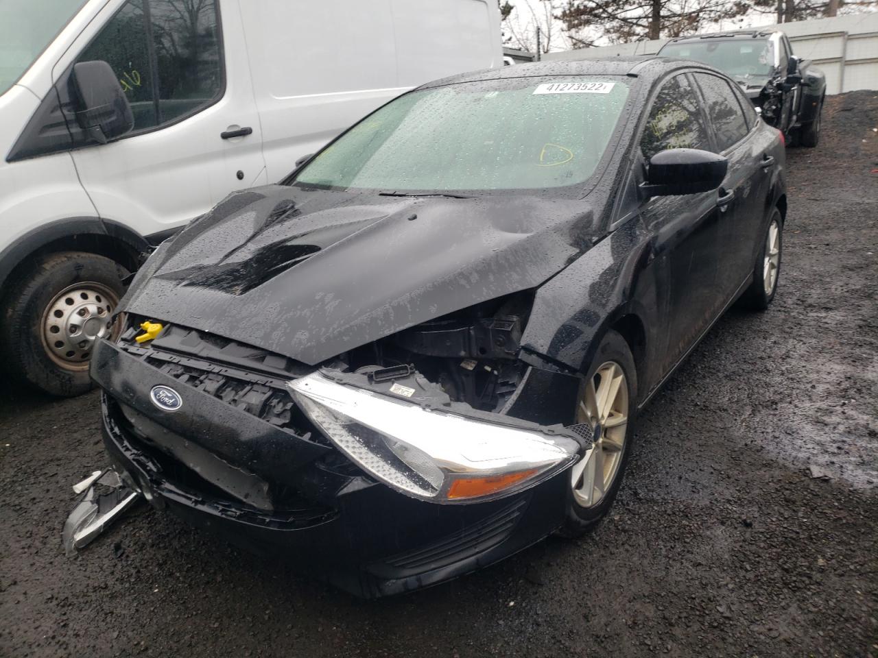 Photo 2 from auction – 2018 FORD FOCUS SE with VIN 1FADP3F21JL315113