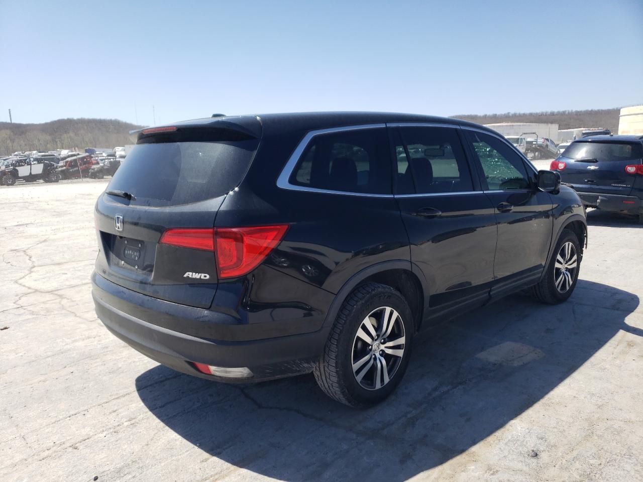 Photo 4 from auction – 2016 HONDA PILOT EXL with VIN 5FNYF6H52GB022937