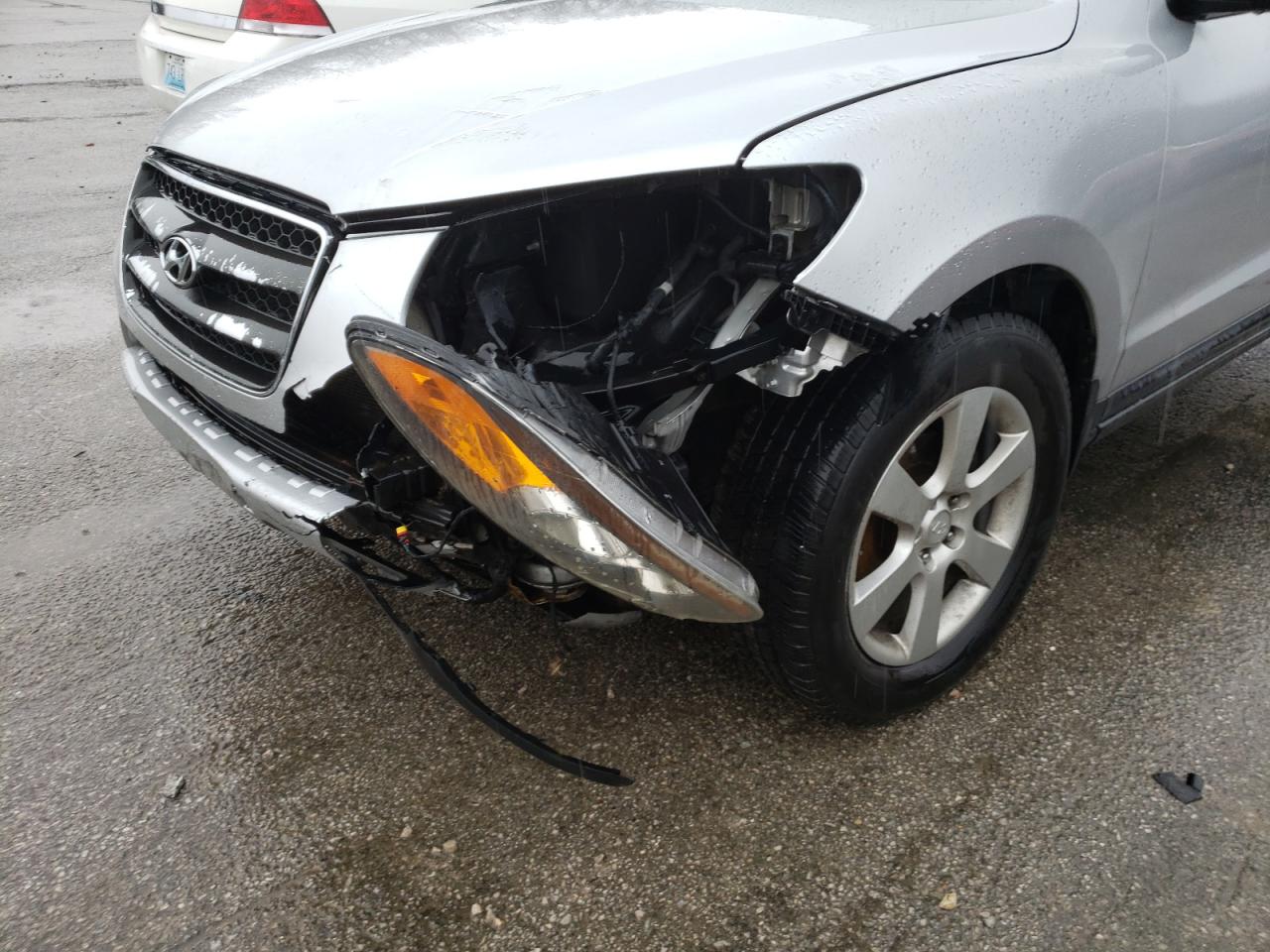 Photo 9 from auction – 2007 HYUNDAI SANTA FE S with VIN 5NMSH13E77H097075