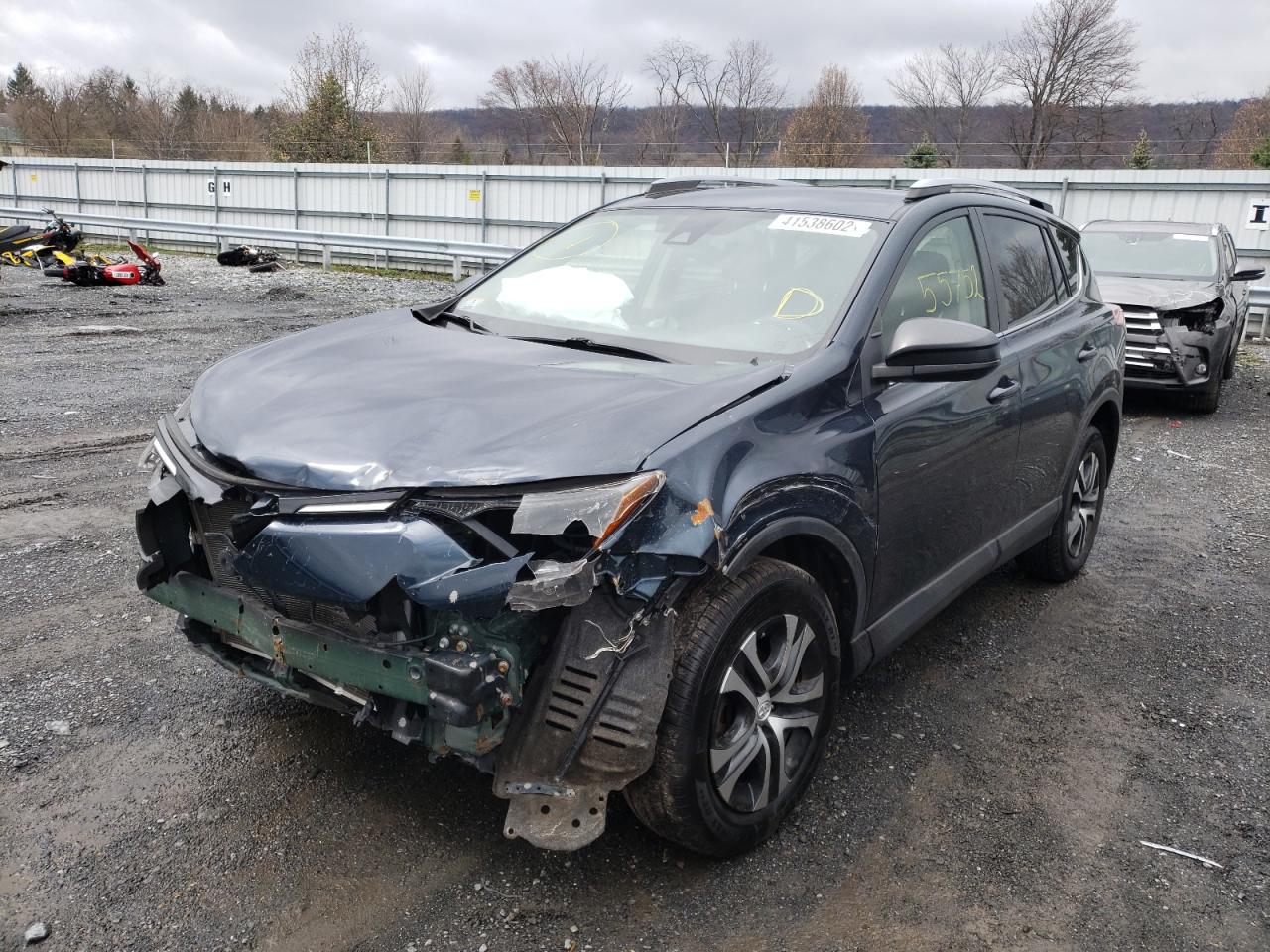 Photo 2 from auction – 2017 TOYOTA RAV4 LE with VIN JTMBFREV7HJ119170