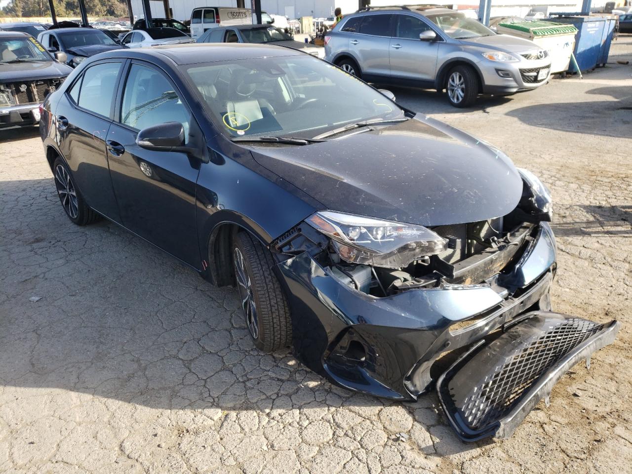TOYOTA COROLLA L 2017 with VIN 5YFBURHE9HP699177 - Photo from auction