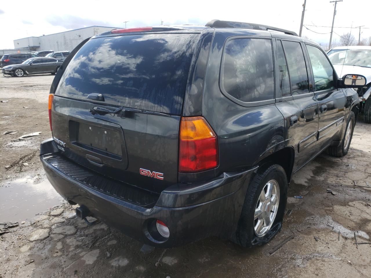 Photo 4 from auction – 2004 GMC ENVOY with VIN 1GKDS13S742187721