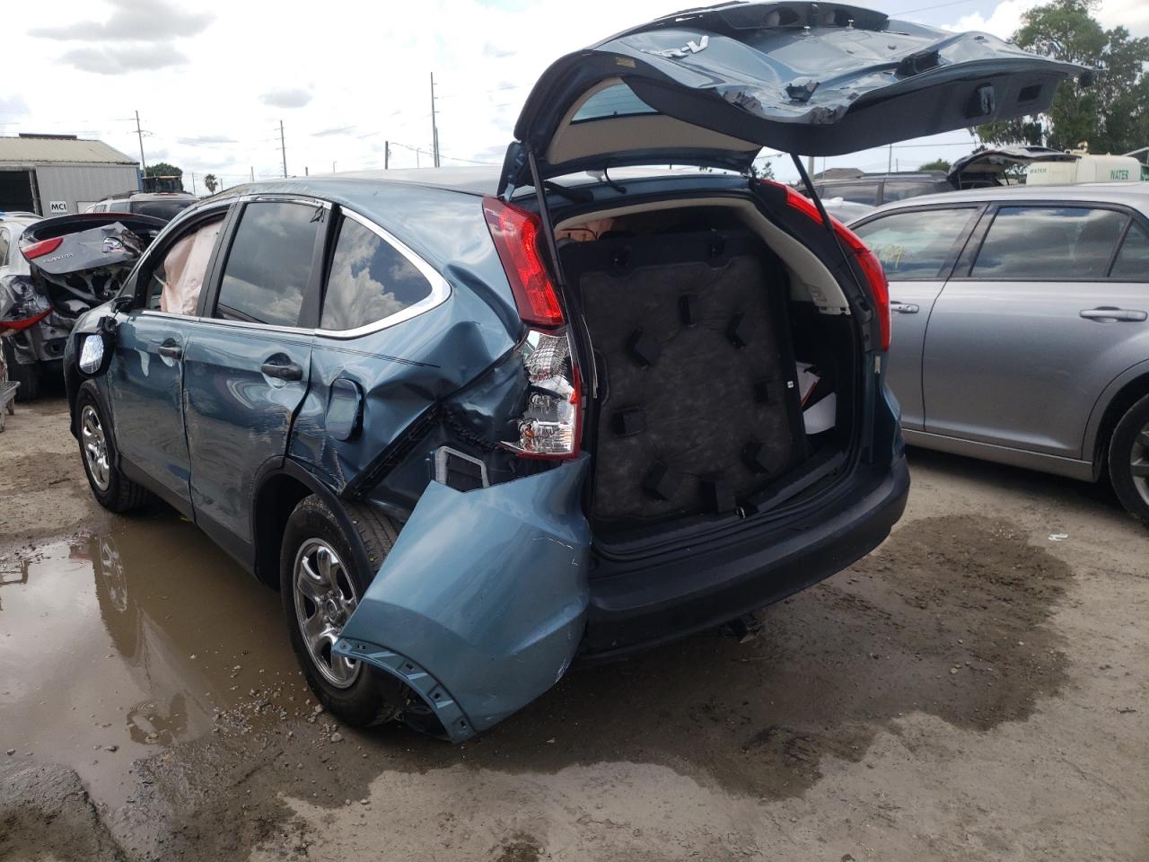 Photo 9 from auction – 2013 HONDA CR-V LX with VIN 5J6RM3H30DL037186