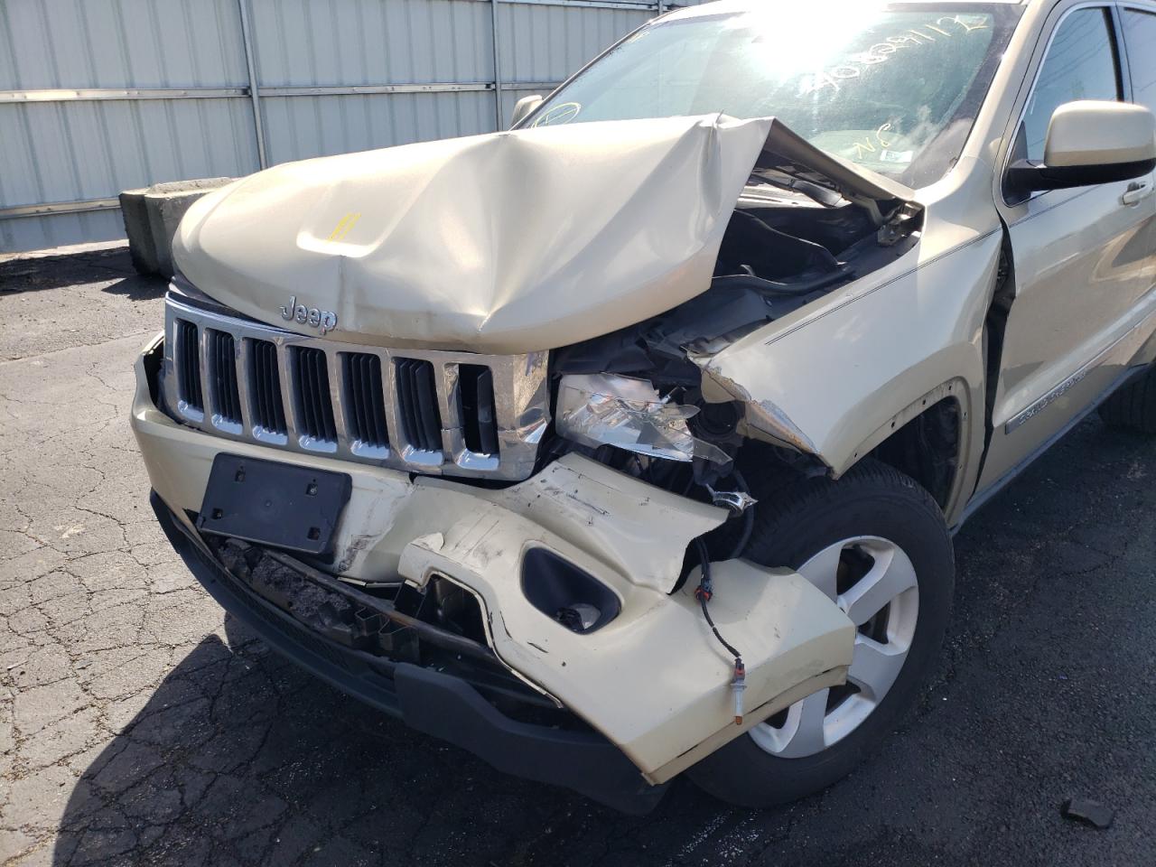 Photo 9 from auction – 2011 JEEP GRAND CHER with VIN 1J4RR4GG3BC709640