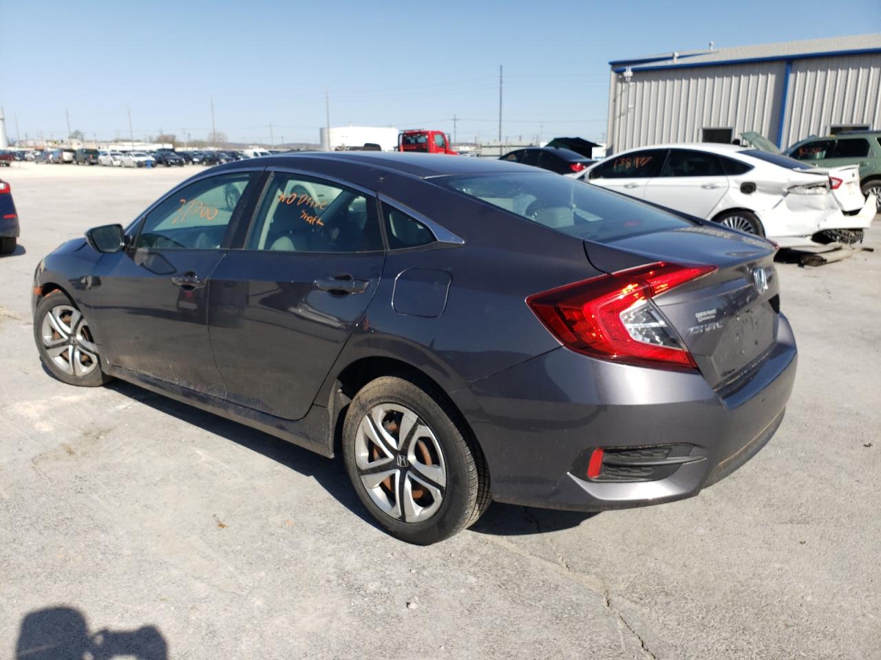 Photo 3 from auction – 2016 HONDA CIVIC LX with VIN 19XFC2F52GE209600