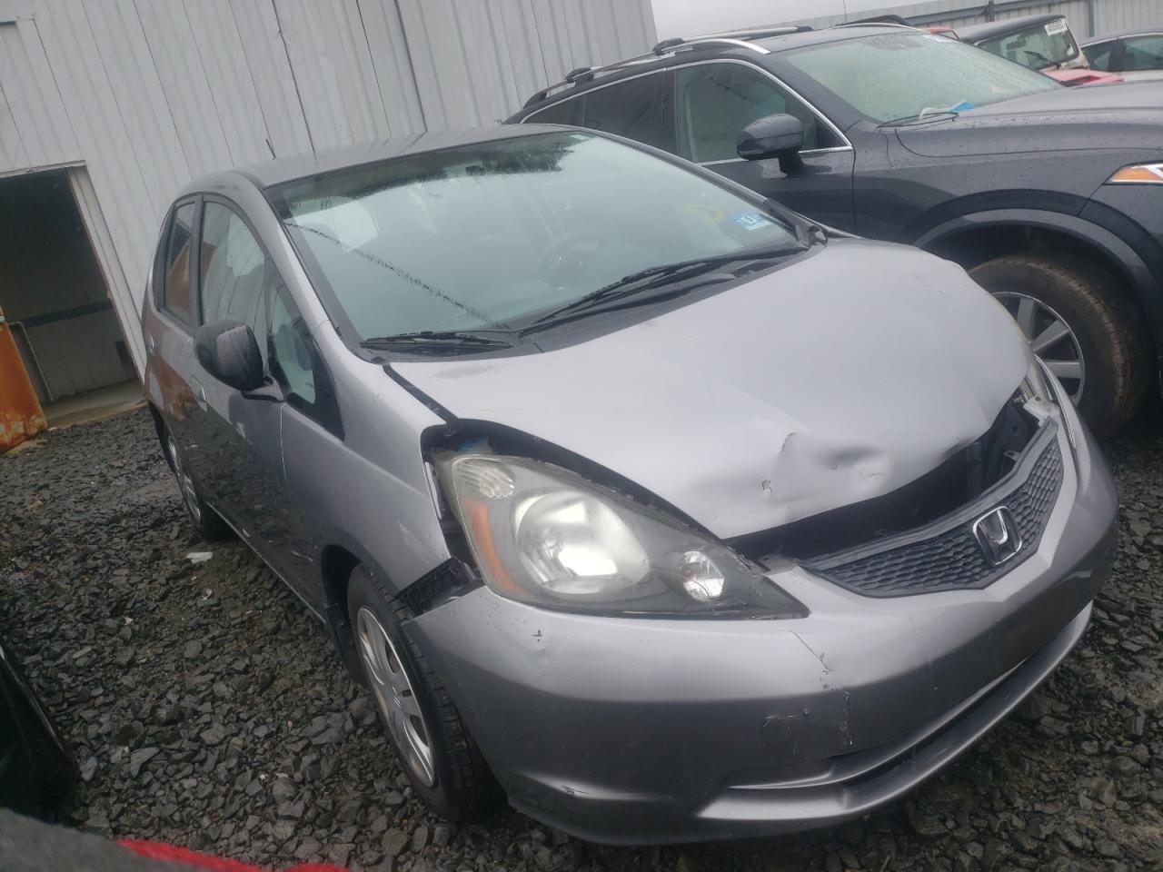HONDA FIT 2009 with VIN JHMGE88219C006582 - Photo from auction