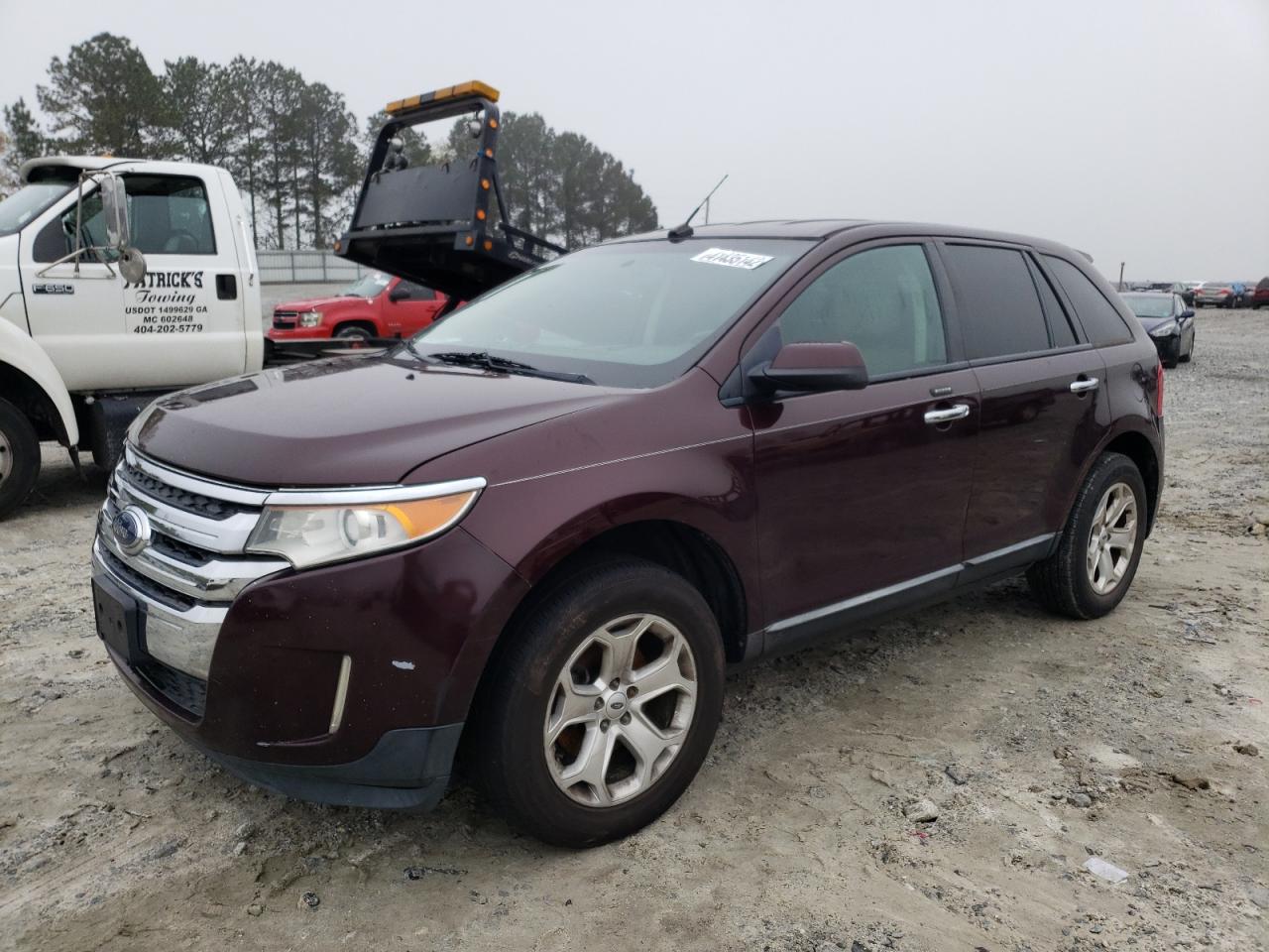 Photo 2 from auction – 2011 FORD EDGE SEL with VIN 2FMDK4JC9BBA89205