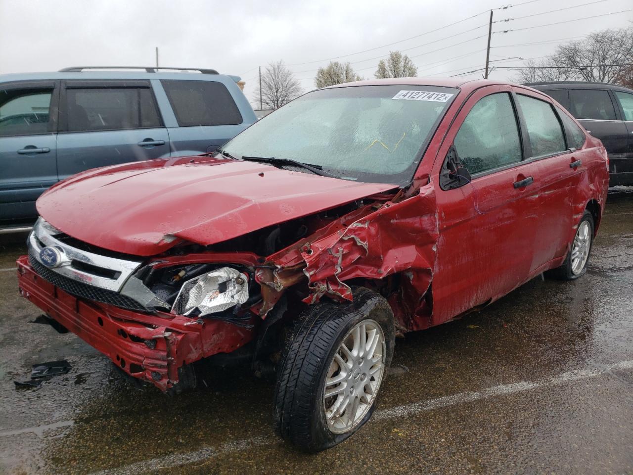 Photo 2 from auction – 2011 FORD FOCUS SE with VIN 1FAHP3FN5BW106226