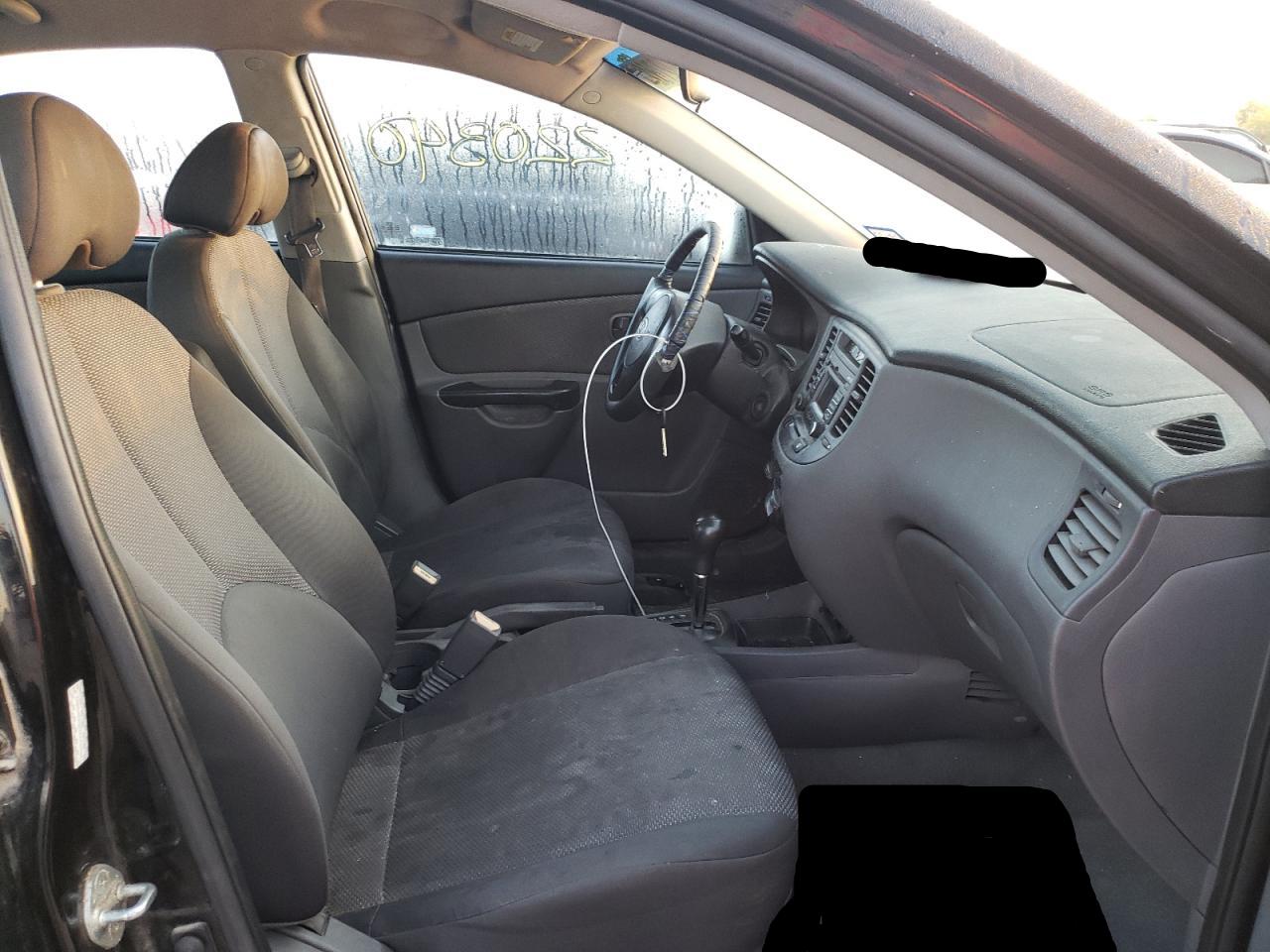 Photo 5 from auction – 2010 KIA RIO LX with VIN KNADH4A38A6646909