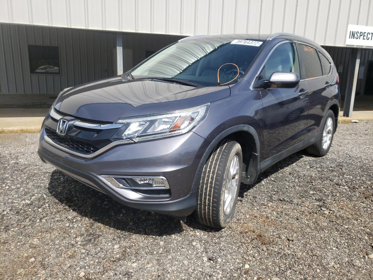 Photo 2 from auction – 2016 HONDA CR-V EXL with VIN 2HKRM3H77GH500152