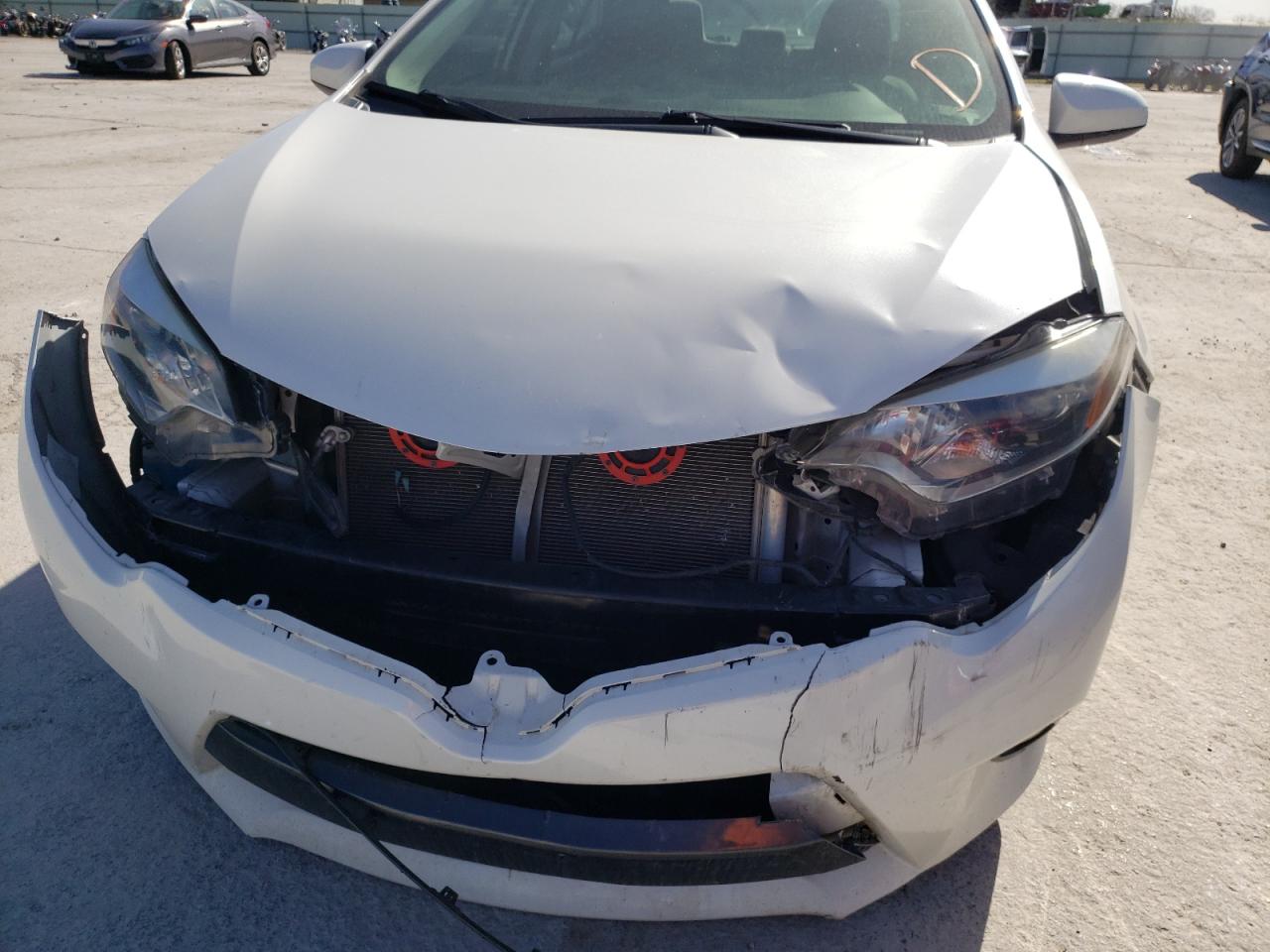 Photo 9 from auction – 2015 TOYOTA COROLLA EC with VIN 5YFBPRHE9FP329139