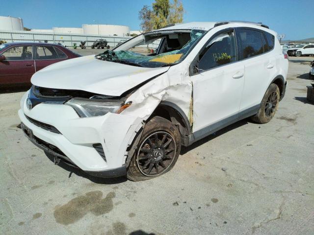 Photo 2 from auction – 2016 TOYOTA RAV4 LE with VIN JTMZFREV5GJ078177