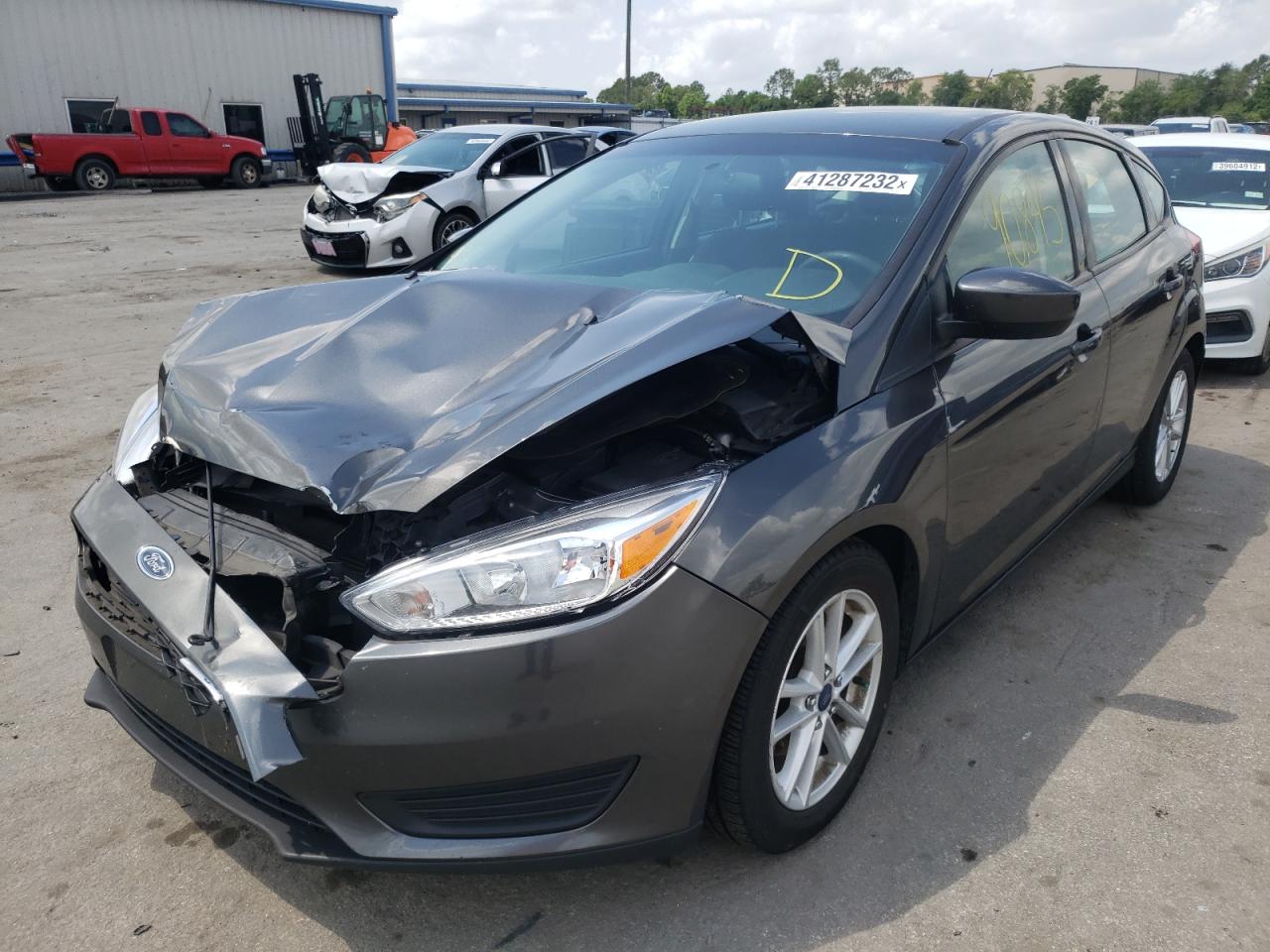 Photo 2 from auction – 2018 FORD FOCUS SE with VIN 1FADP3K21JL245666