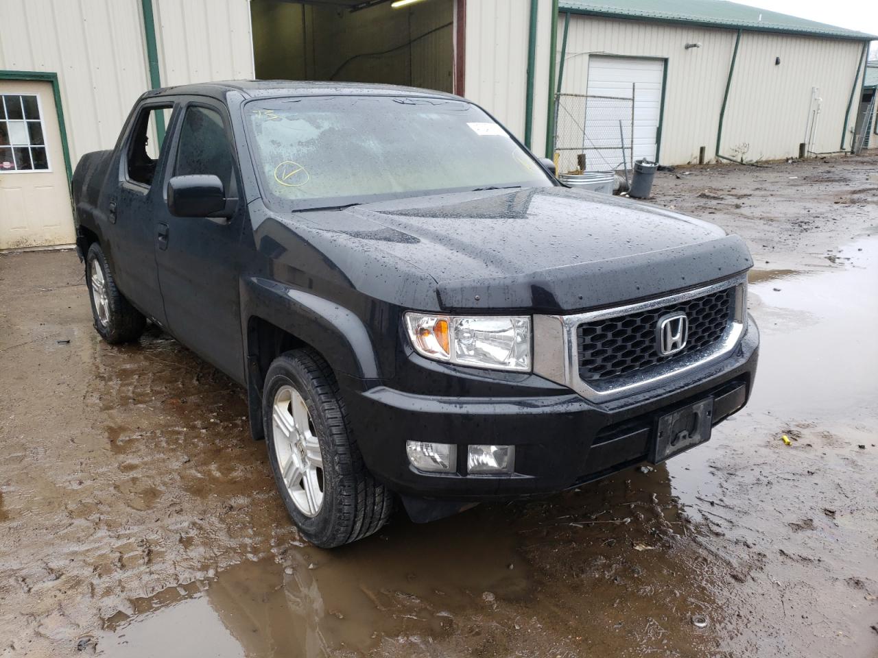 HONDA RIDGELINE 2012 with VIN 5FPYK1F5XCB002163 - Photo from auction