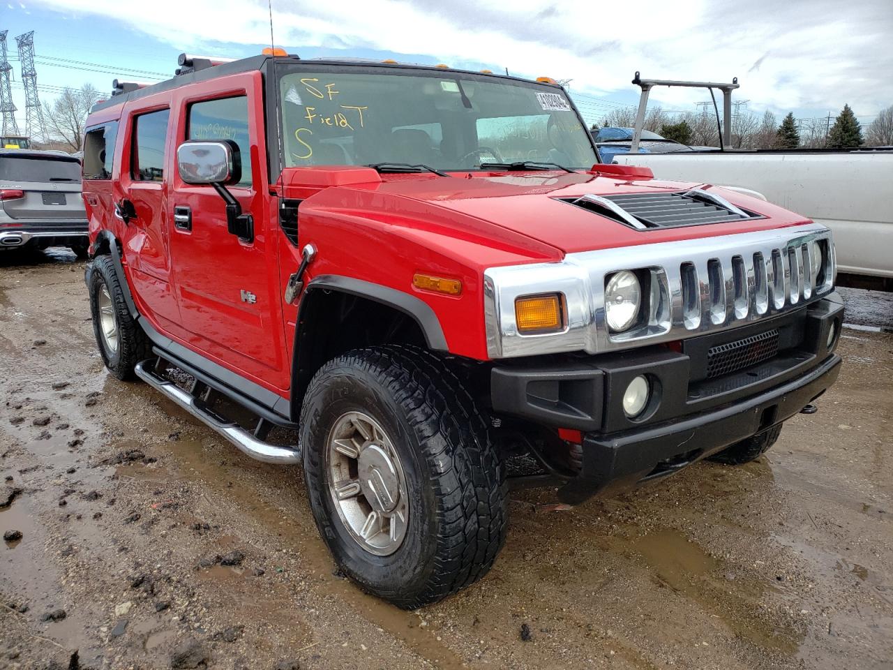 HUMMER H2 2004 with VIN 5GRGN23U44H113871 - Photo from auction