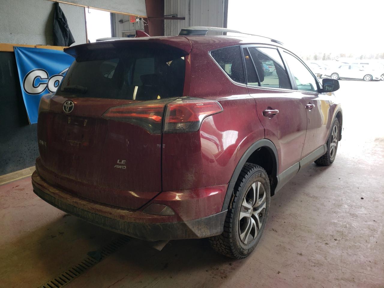 Photo 4 from auction – 2018 TOYOTA RAV4 LE with VIN 2T3BFREV5JW810821
