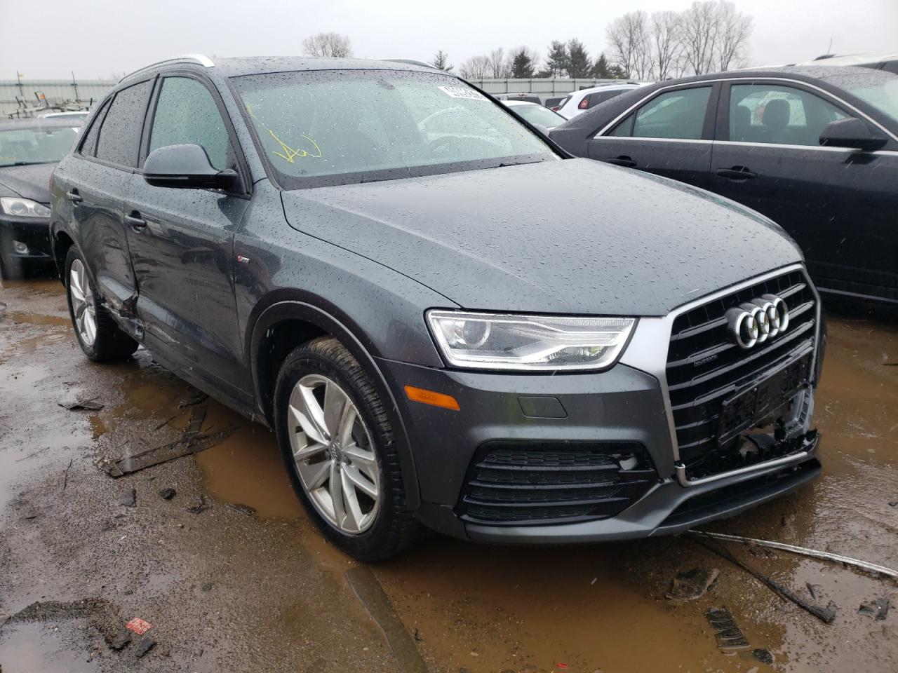 AUDI Q3 PREMIUM 2018 with VIN WA1ECCFS4JR027040 - Photo from auction