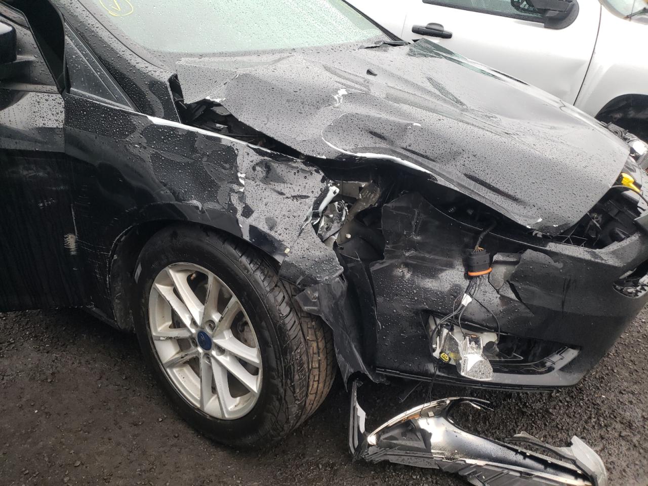 Photo 9 from auction – 2018 FORD FOCUS SE with VIN 1FADP3F21JL315113