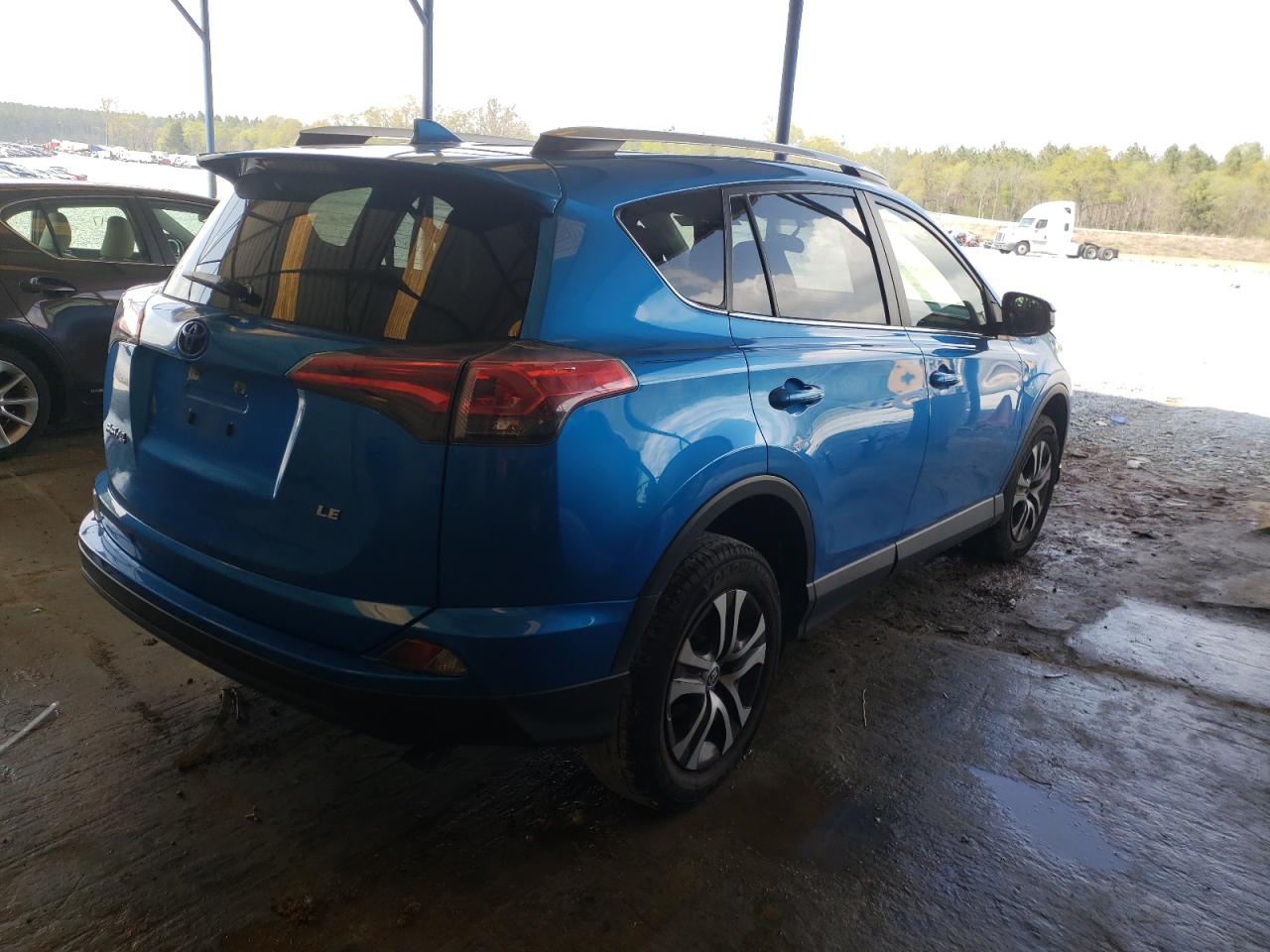Photo 4 from auction – 2016 TOYOTA RAV4 LE with VIN JTMZFREV6GJ084313