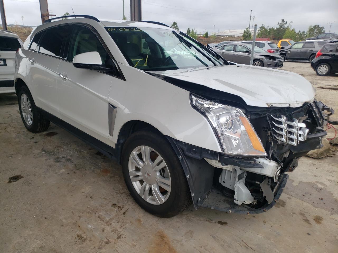 CADILLAC SRX 2013 with VIN 3GYFNAE33DS529973 - Photo from auction