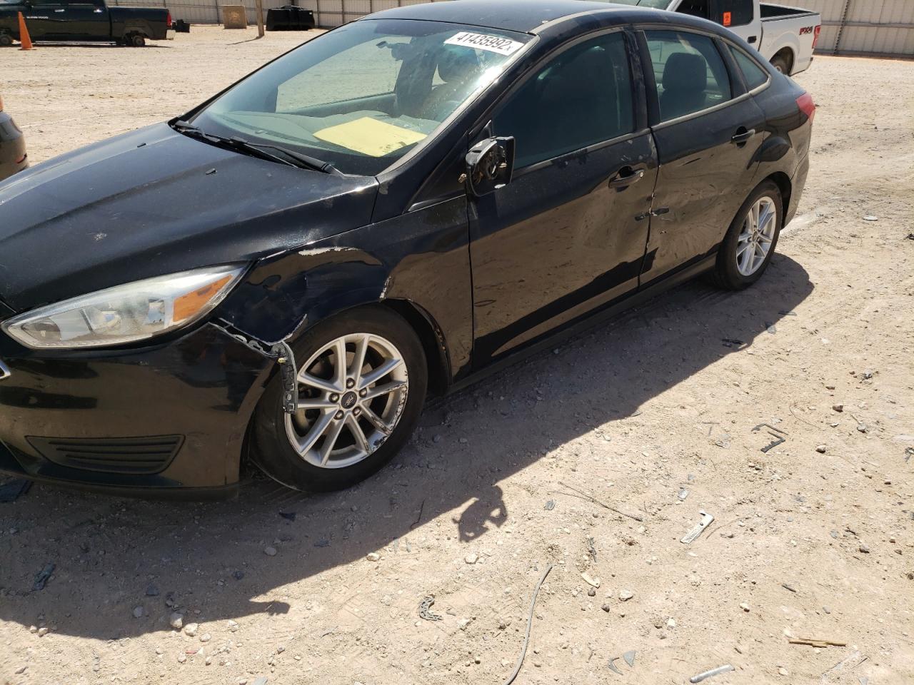 Photo 9 from auction – 2016 FORD FOCUS SE with VIN 1FADP3F2XGL239495