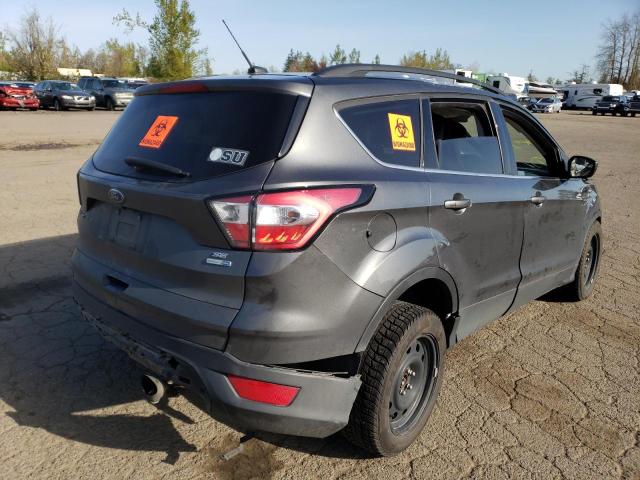 Photo 4 from auction – 2018 FORD ESCAPE SE with VIN 1FMCU9G90JUC50127