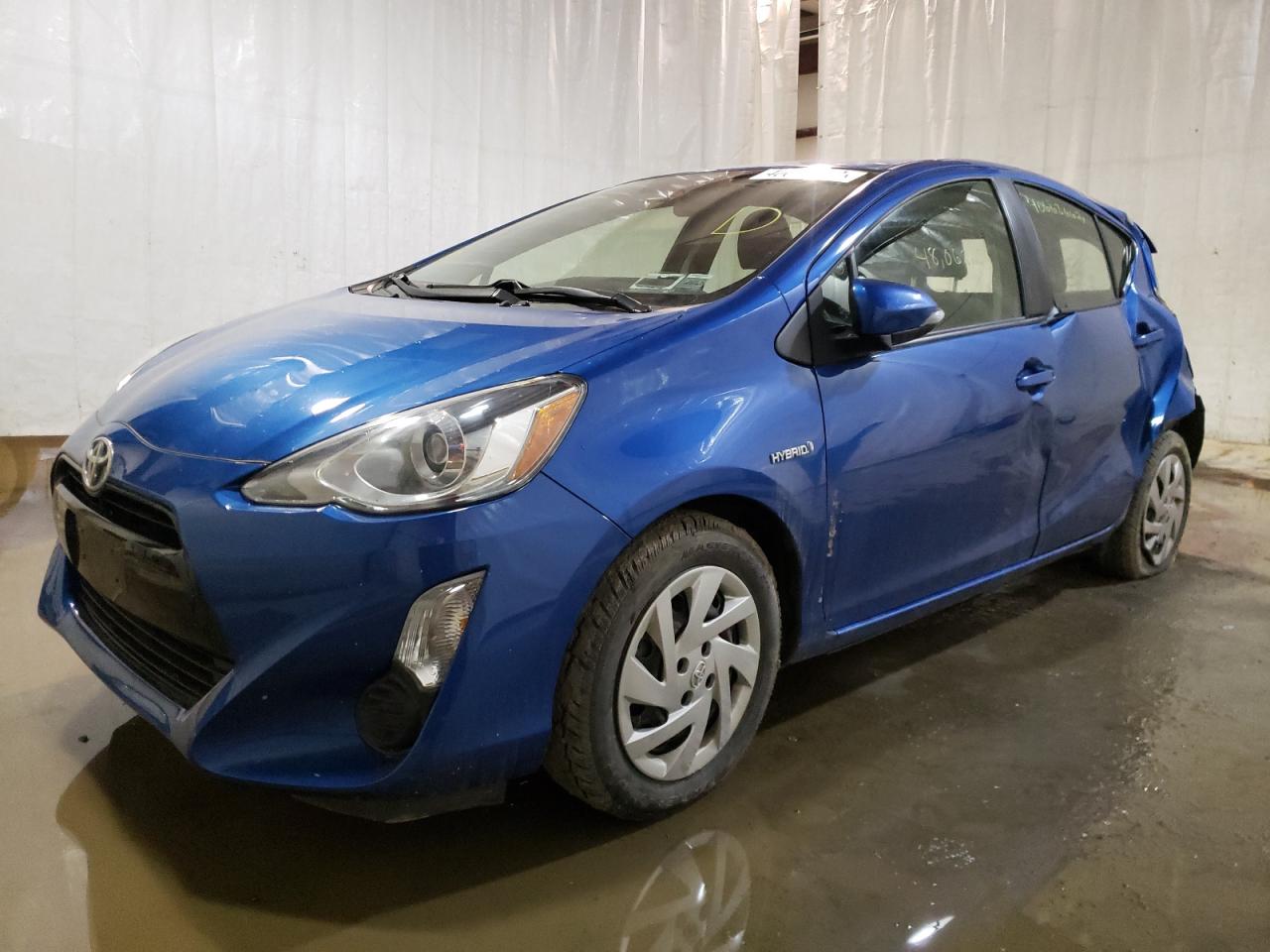 Photo 2 from auction – 2015 TOYOTA PRIUS C with VIN JTDKDTB32F1106958