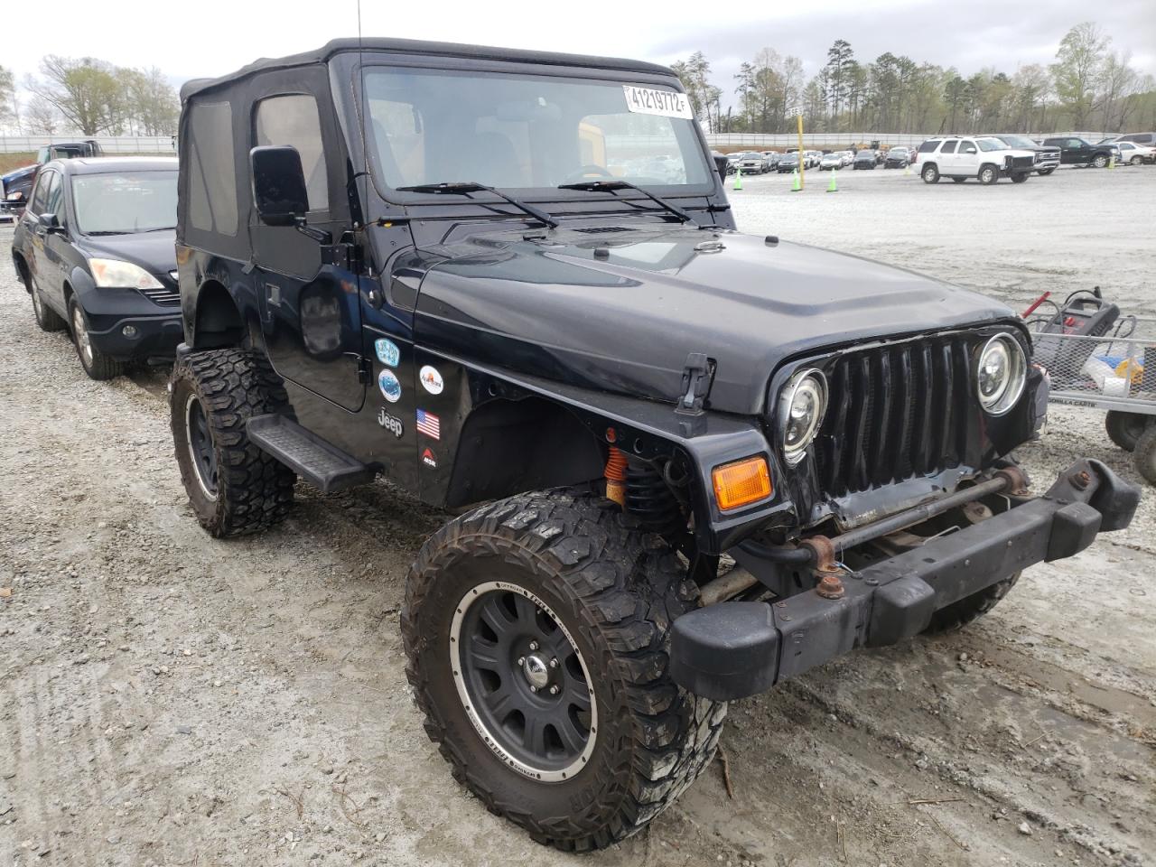 JEEP WRANGLER / 2001 with VIN 1J4FA49S71P348898 - Photo from auction