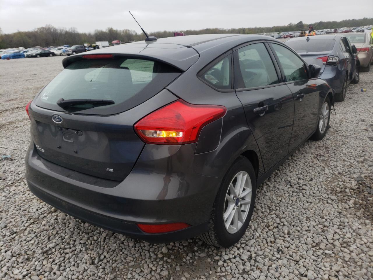 Photo 4 from auction – 2018 FORD FOCUS SE with VIN 1FADP3K2XJL212102