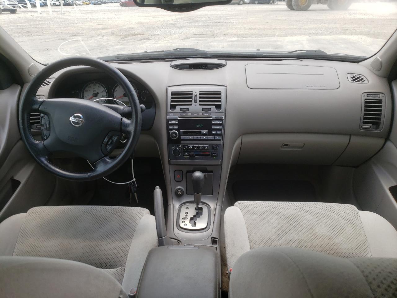Photo 9 from auction – 2002 NISSAN MAXIMA GLE with VIN JN1DA31D02T411193