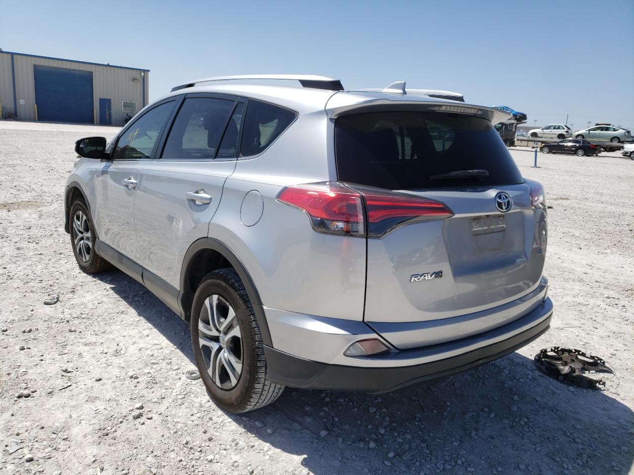 Photo 3 from auction – 2018 TOYOTA RAV4 LE with VIN JTMZFREV6JJ169983