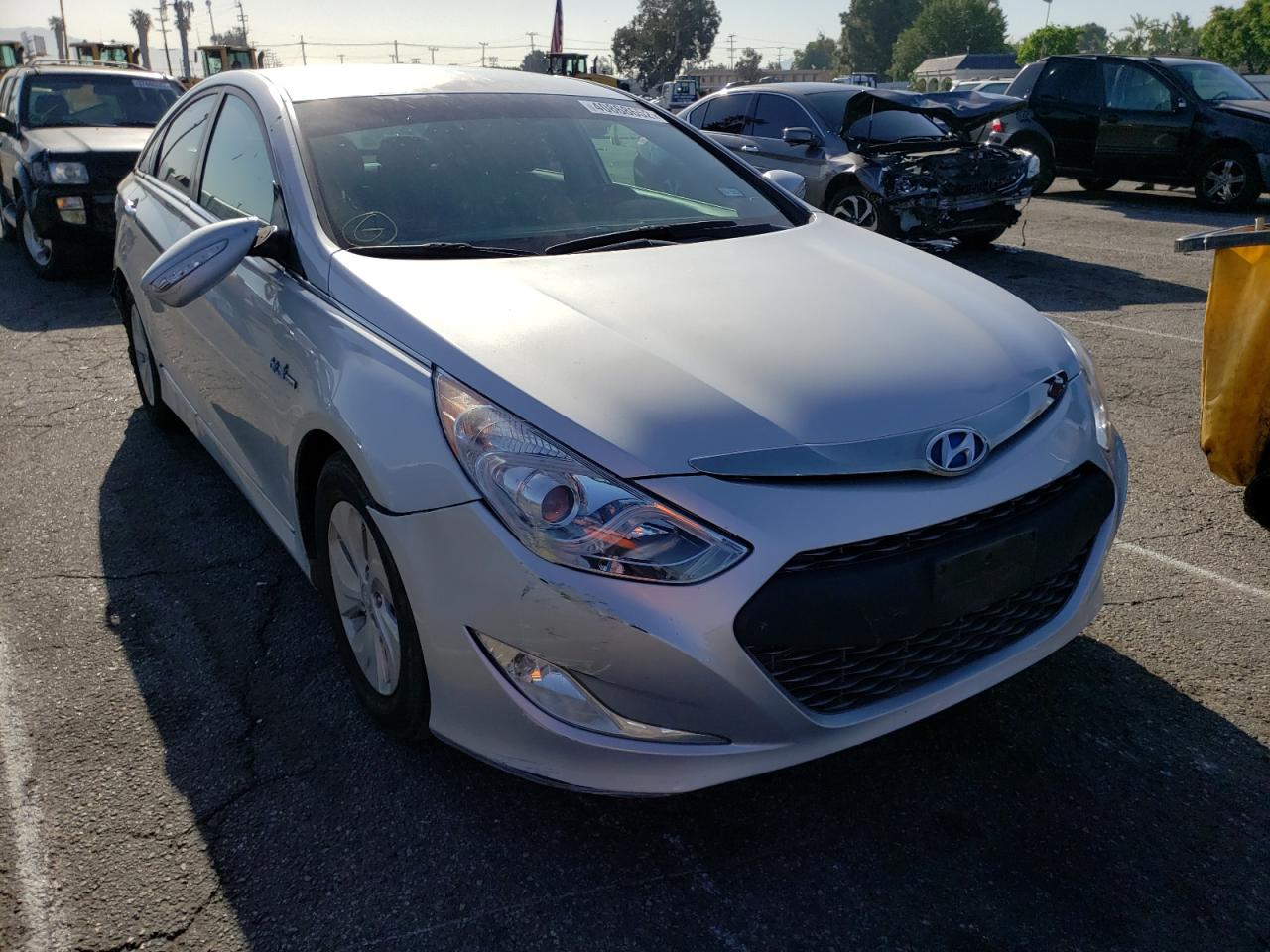HYUNDAI SONATA HYB 2015 with VIN KMHEC4A41FA139753 - Photo from auction