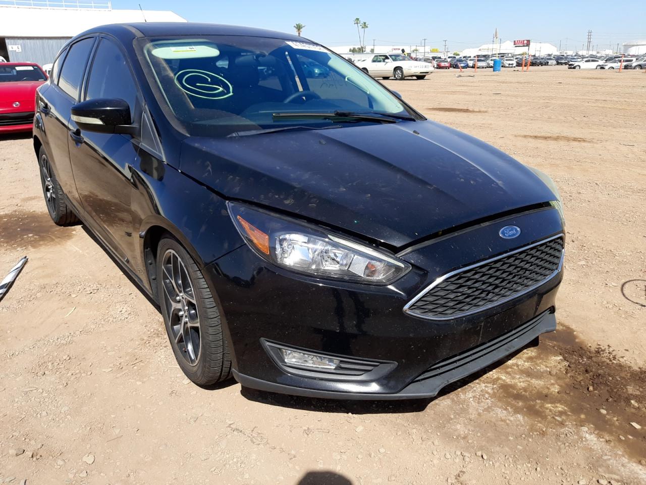 FORD FOCUS SEL 2017 with VIN 1FADP3M21HL303976 - Photo from auction