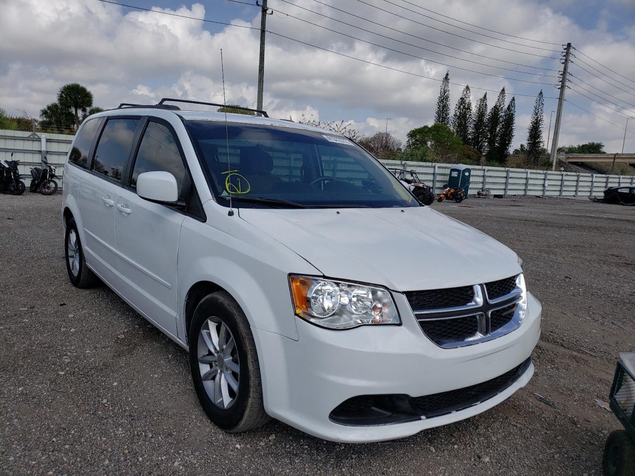 DODGE GRAND CARA 2014 with VIN 2C4RDGCG7ER390332 - Photo from auction