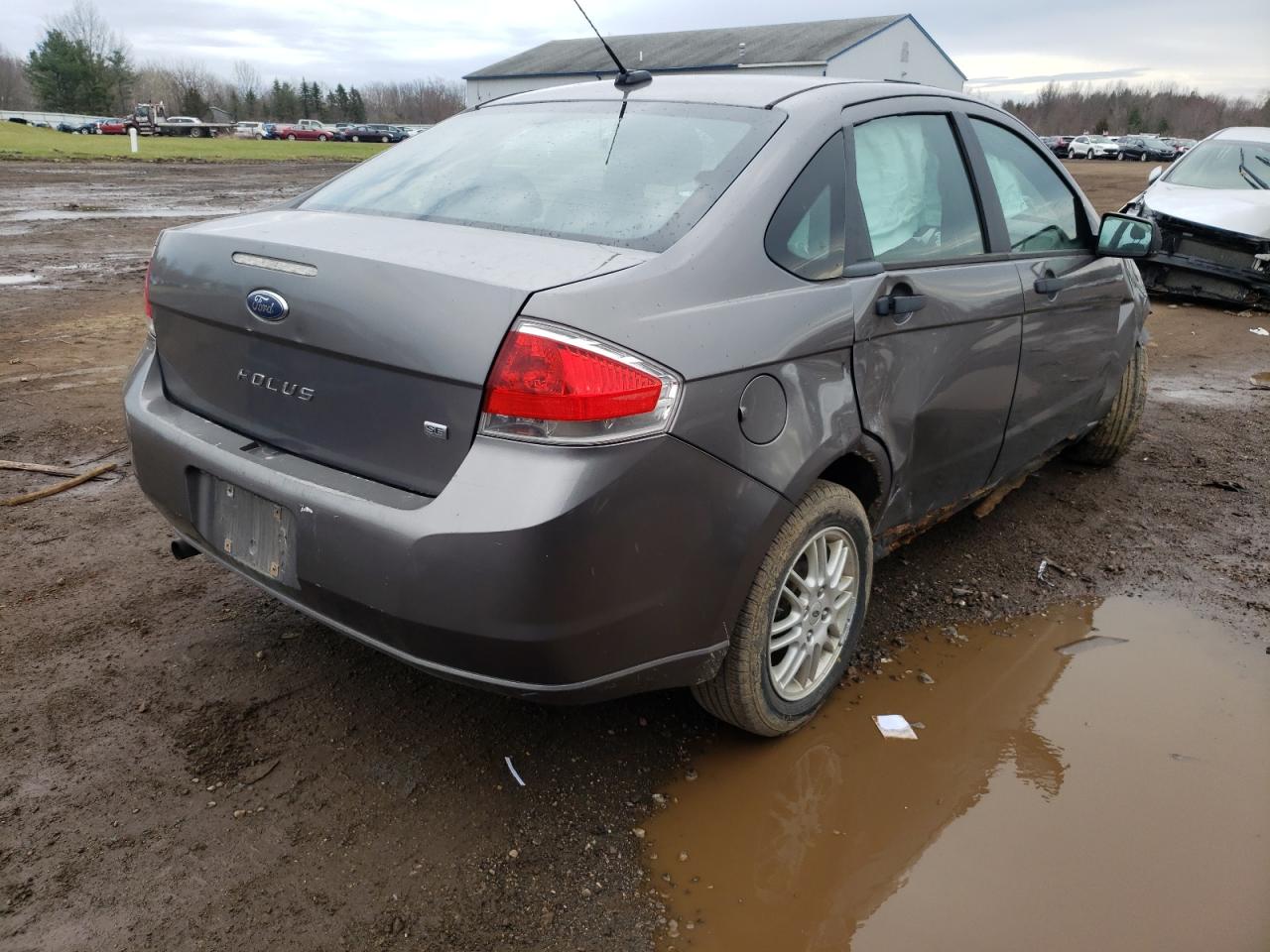 Photo 4 from auction – 2011 FORD FOCUS with VIN 1FAHP3FN3BW176887