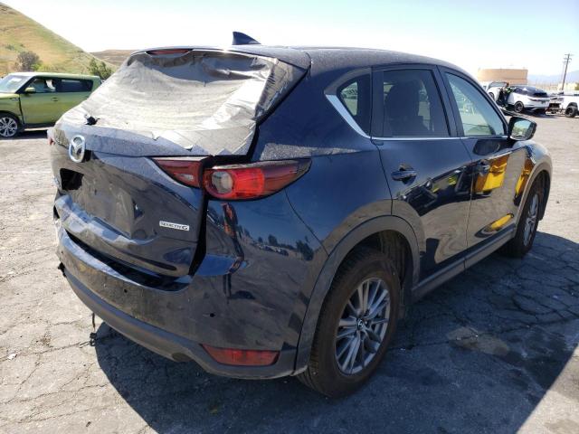 Photo 4 from auction – 2021 MAZDA CX-5 TOURI with VIN JM3KFBCM0M1314238