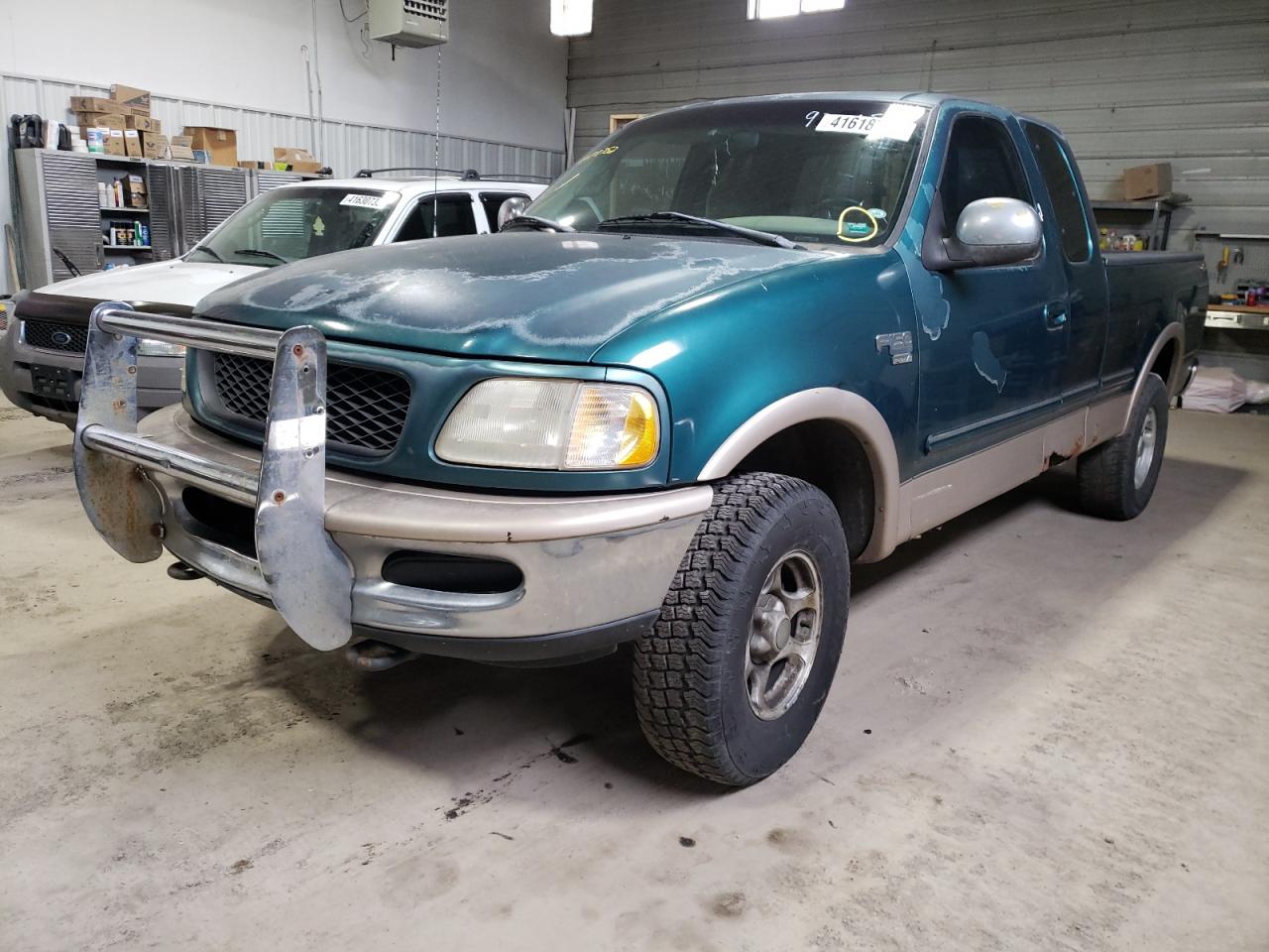 Photo 2 from auction – 1998 FORD F150 with VIN 1FTRX18L2WKC24438