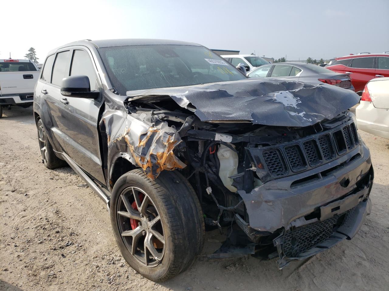JEEP GRAND CHER 2017 with VIN 1C4RJFDJ2HC641056 - Photo from auction