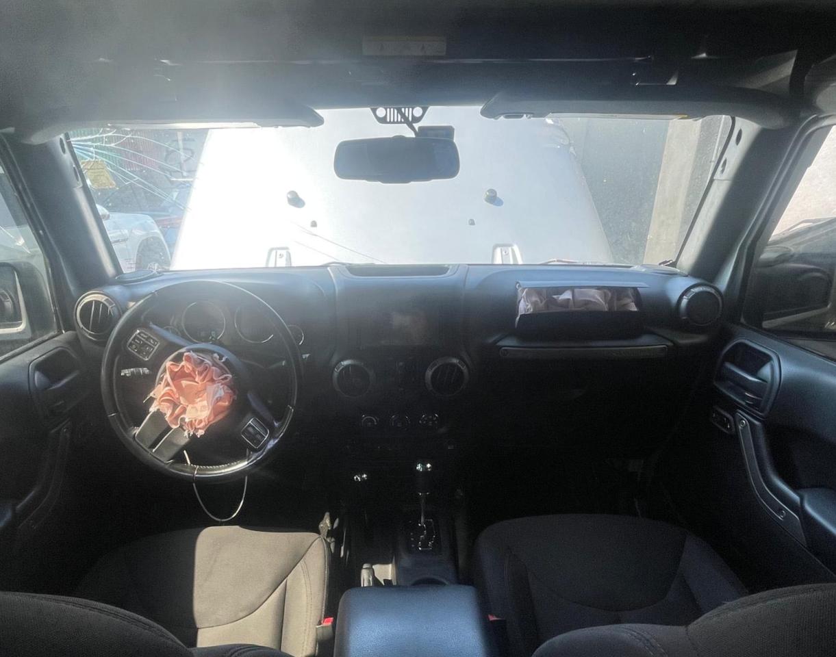 Photo 9 from auction – 2016 JEEP WRANGLER U with VIN 1C4BJWDG6GL120250