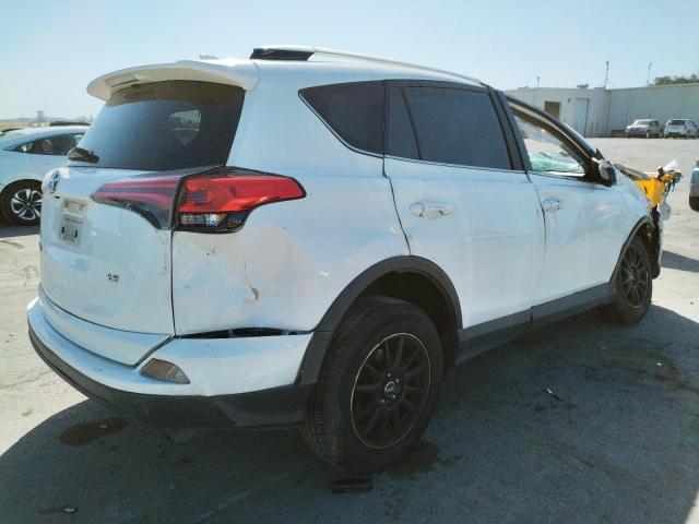 Photo 4 from auction – 2016 TOYOTA RAV4 LE with VIN JTMZFREV5GJ078177