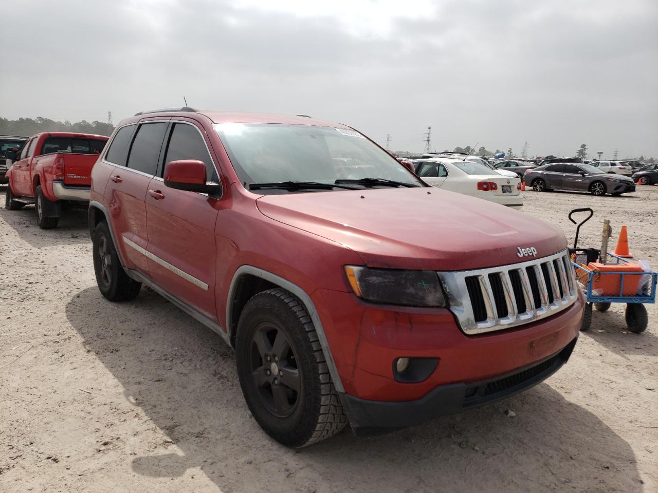 JEEP GRAND CHER 2011 with VIN 1J4RS4GG8BC582761 - Photo from auction