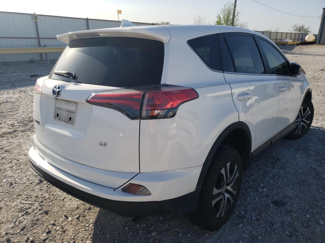 Photo 4 from auction – 2018 TOYOTA RAV4 LE with VIN JTMZFREV3JJ731984