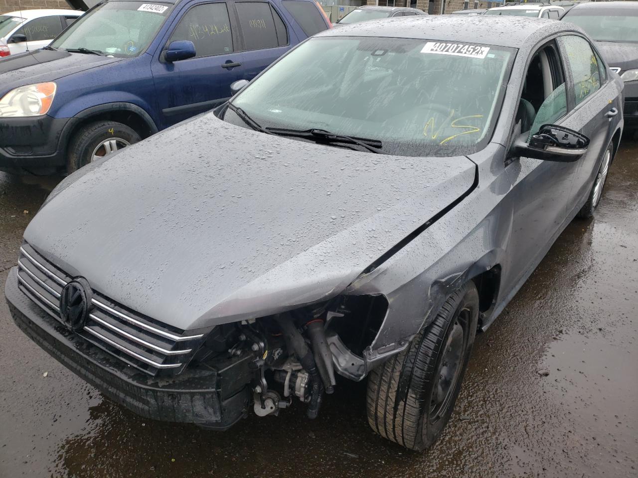 Photo 2 from auction – 2014 VOLKSWAGEN PASSAT S with VIN 1VWAT7A38EC120905