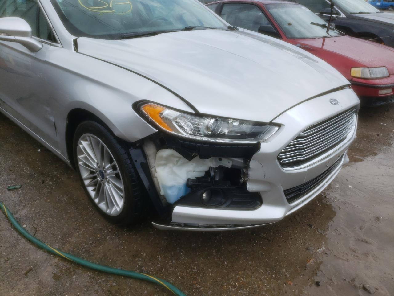 Photo 9 from auction – 2014 FORD FUSION SE with VIN 3FA6P0H91ER248098