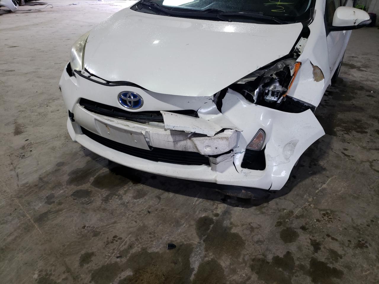 Photo 9 from auction – 2012 TOYOTA PRIUS C with VIN JTDKDTB31C1510104